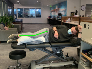 pillow between legs sleeping position lateral hip pain the prehab guys